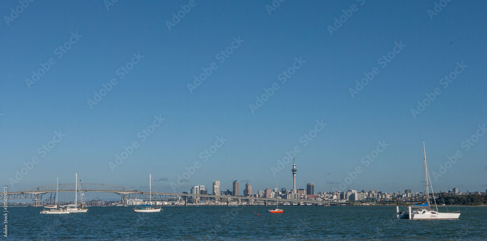 Auckland New Zealand Skyline. Boats in front. Panorama.