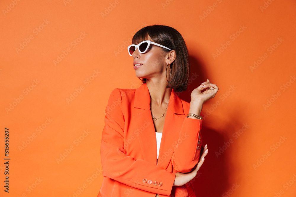 Beautiful young woman wearing jacket standing Beautiful young woman wearing jacket standing