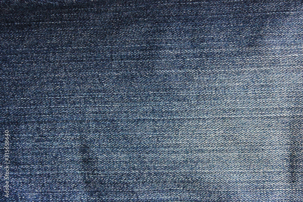 Dark blue denim jeans background. Washed out old jean fabric pattern,  casual denim cloth texture, empty clothing concept wallpaper foto de Stock  | Adobe Stock