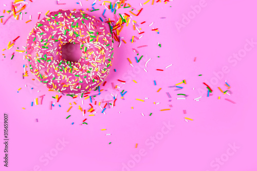 Donut on a pink background.