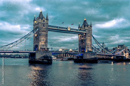 Tower Bridge in London, the UK - one of English symbols. Evening blue hour photography.