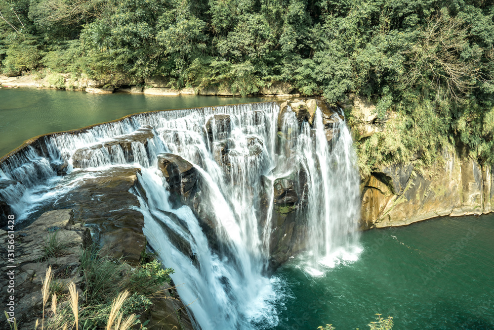 Obraz premium Shihfen Waterfall, Fifteen meters tall and 30 meters wide, It is the largest curtain-type waterfall in Taiwan
