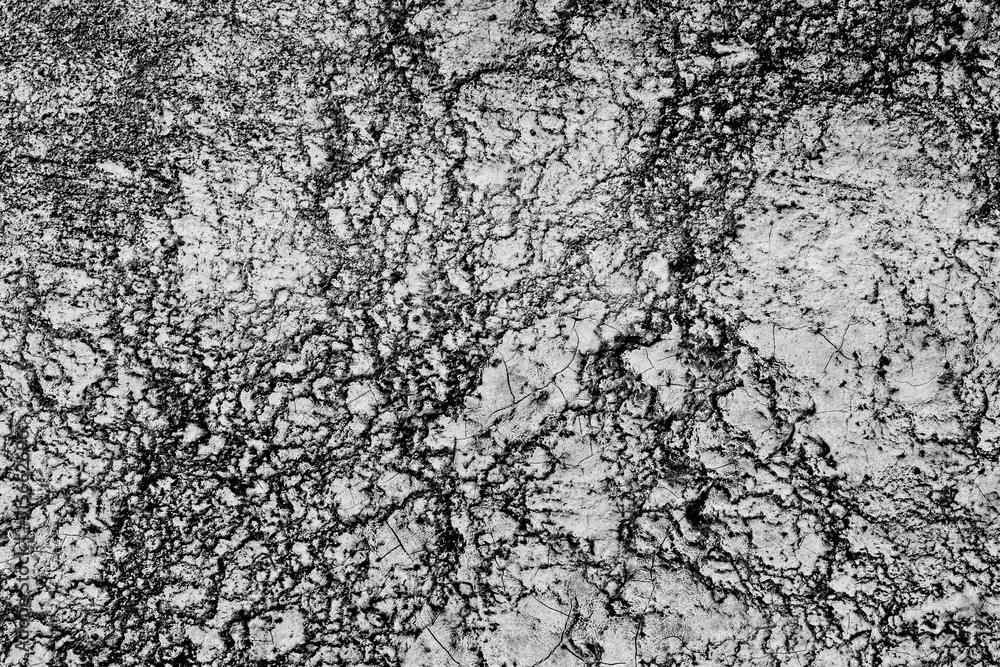 The surface. The asphalt is black. The surface. The asphalt is black.