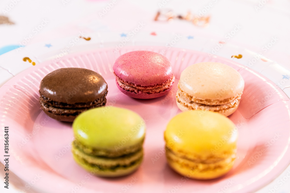 Several French multicolored macarons during a party