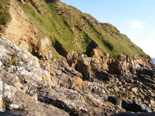 rocky shore/ hill side