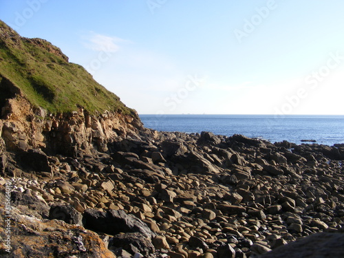 rocky shore/ hill side