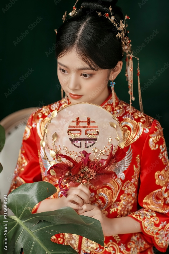 Beautiful Asian classical woman holding a fan Beautiful Asian classical woman holding a fan