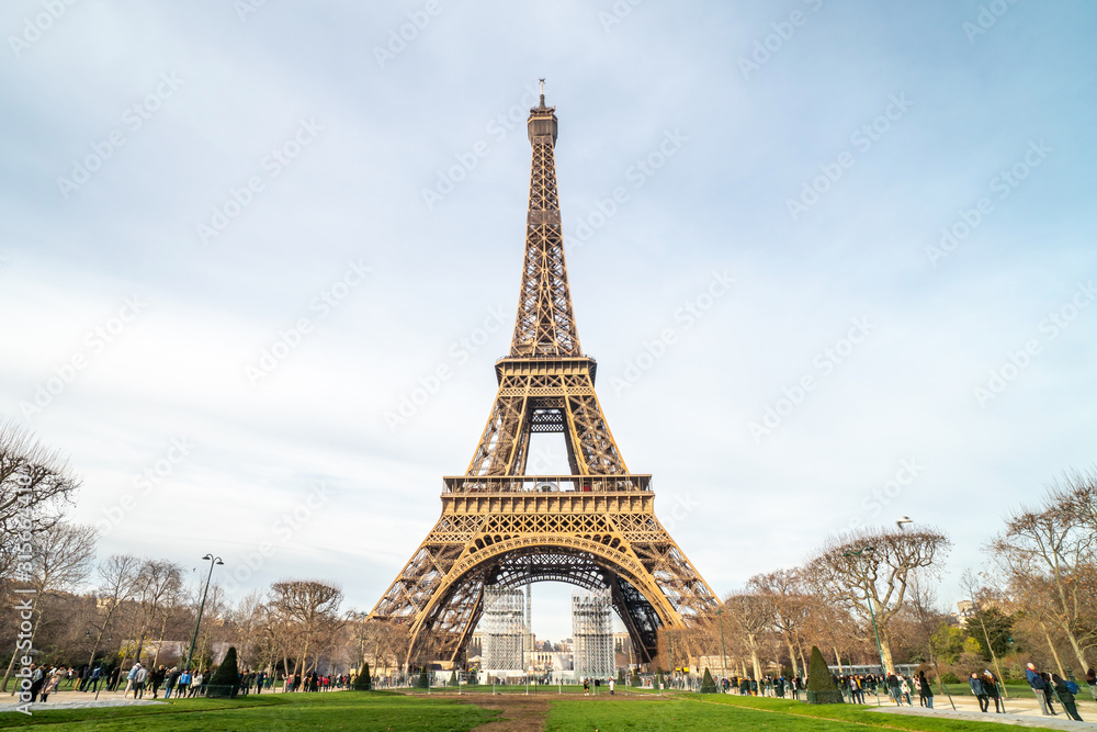 Fototapeta premium Beautiful view of famous Eiffel Tower in Paris at winter time, France. Paris Best Destinations in Europe.