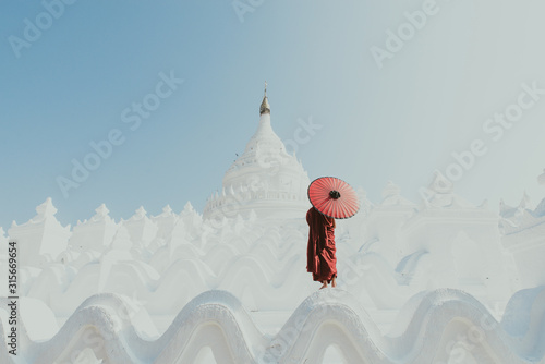 Children monks spending time together at the pagoda. In myanmar childrens start the training to become monks at the age of seven photo