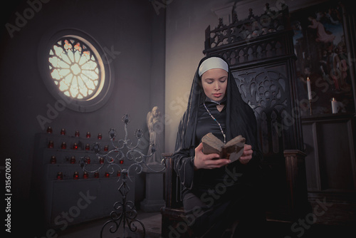 Photos Nun praying in the convent
