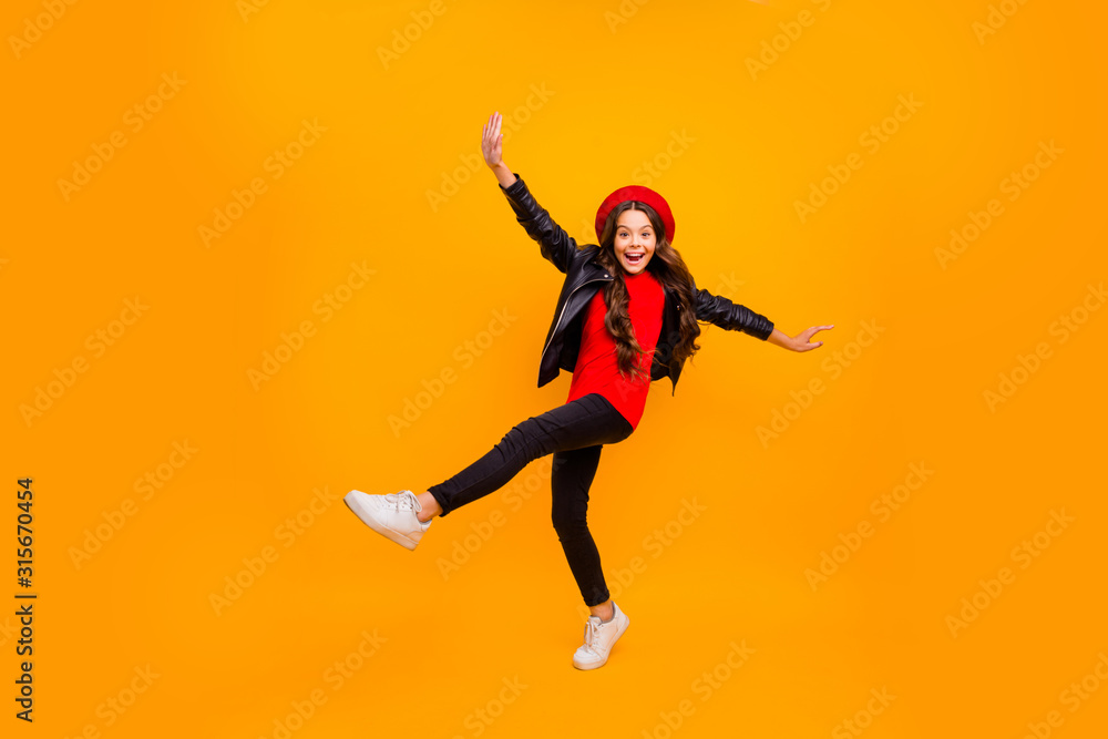 Full length body size view of her she nice attractive lovely cheerful cheery carefree long-haired girl wearing streetstyle dancing isolated over bright vivid shine vibrant yellow color background