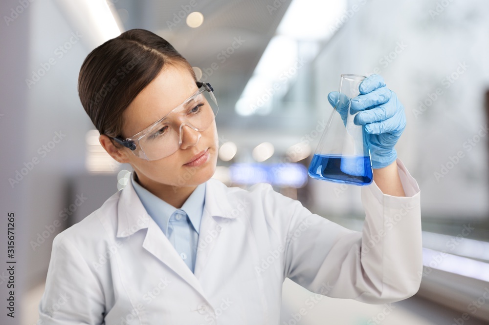 Human Hands with injection syringe and medical background Human Hands with injection syringe and medical background