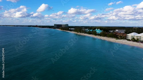 Wallpaper Mural aerial drone footage of seven mile beach on the island of grand cayman in the cayman islands in the tropical waters of the caribbean sea during winter Torontodigital.ca