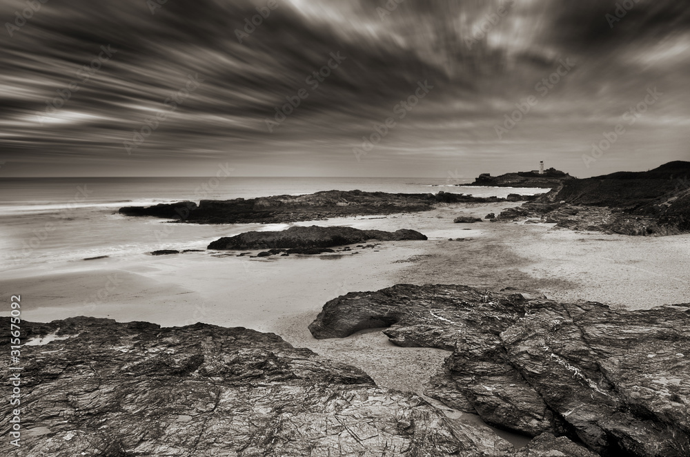 lighthouse stormy coastline