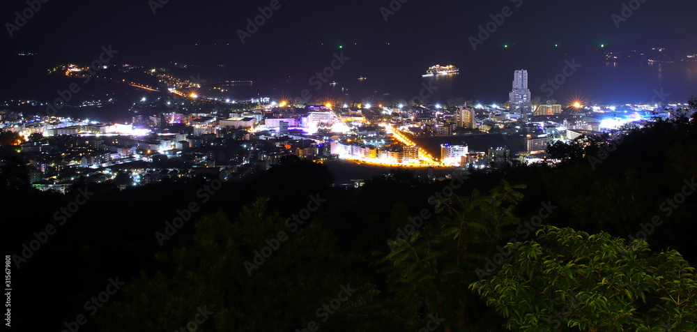 Obraz premium Patong Phuket Thailand nights lights towers and cruise liner