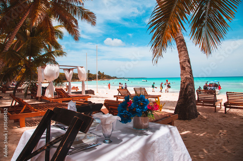  turquoise sea, white sand beach and blue sky in the Dominican Republic © Дмитрий Глухов