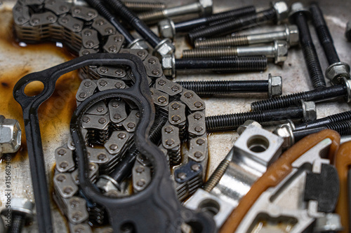 car engine Assembling of vehicle engine parts on the table.