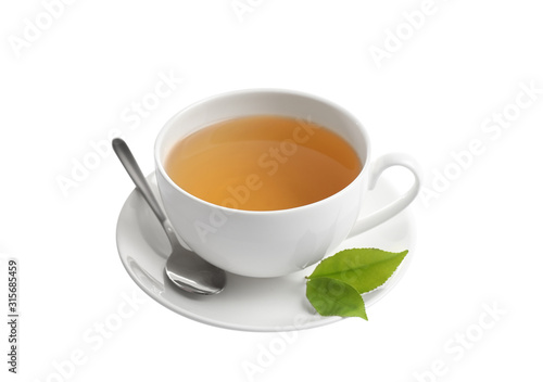 Cup of green tea and leaves isolated on white