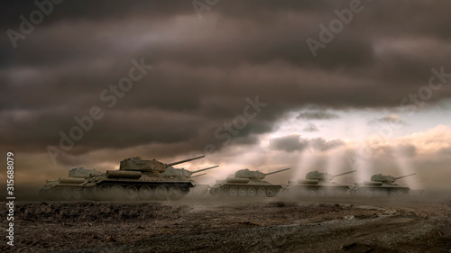 Obraz na plátně A holy war scene of a group of tanks riding under a dramatic sky into rays of li