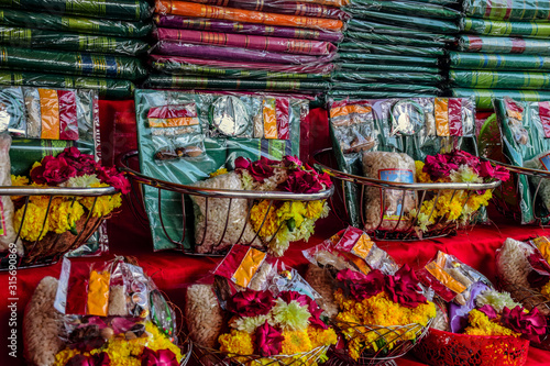 Vendor of item of worship sold at temple area