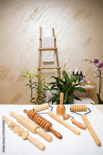 Wooden equipment for anti-cellulite maderotherapy massage photo