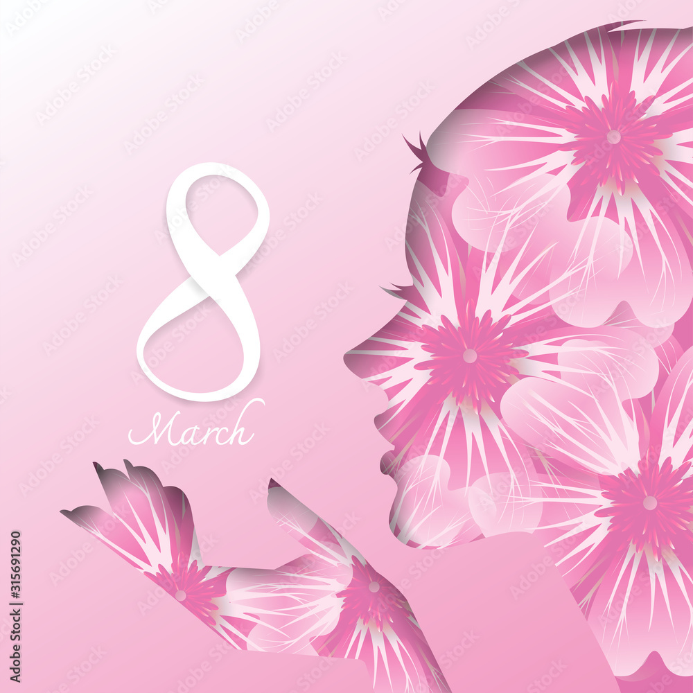 woman's day concept girl face made by a pink flower on pink background