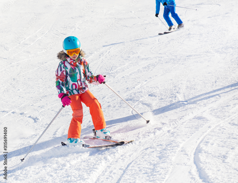 little girl  in ski resort