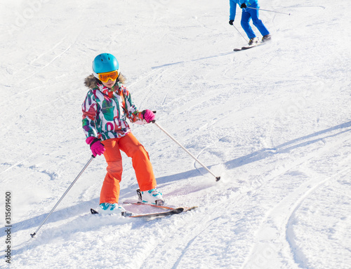 little girl  in ski resort