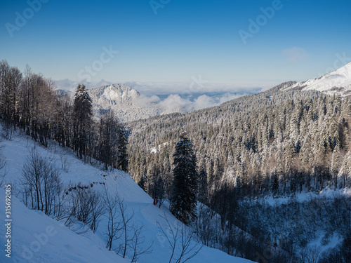 Mountain peaks of the Caucasus at Krasnaya Polyana, the village Rosa Khutor, winter sports resort of Sochi, Krasnodar Krai, Russia