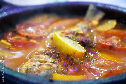 Tajine with stewed vegetables and fish. One of the types of Moroccan national cuisine.