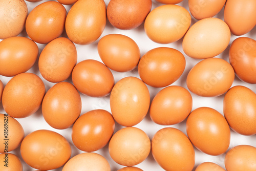 Group of raw brown eggs.