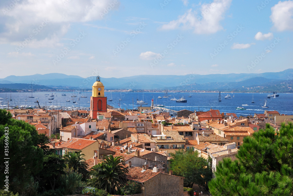 Village of Saint-Tropez with its famous bell tower on a summer afternoon