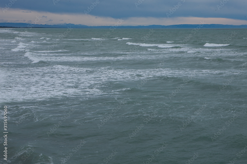 New Brighton. Christchurch New Zealand. Coast. Beach and waves New Brighton. Christchurch New Zealand. Coast. Beach and waves
