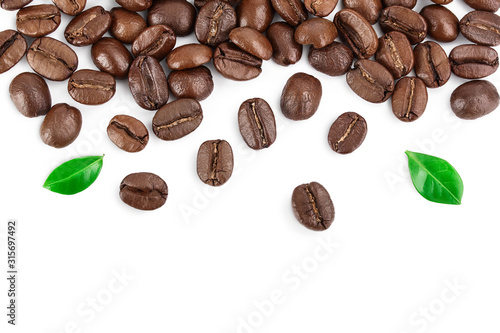 roasted coffee beans with leaves isolated on white background with copy space for your text. Top view. Flat lay. Clipping path and full depth of field