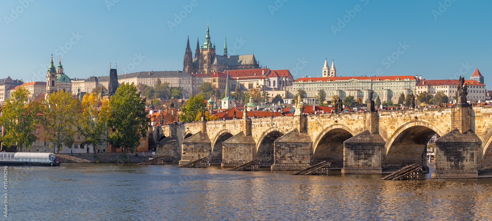 Prague - The panorama of Charles Bridge, Castle and Cathedral withe the Vltava river.