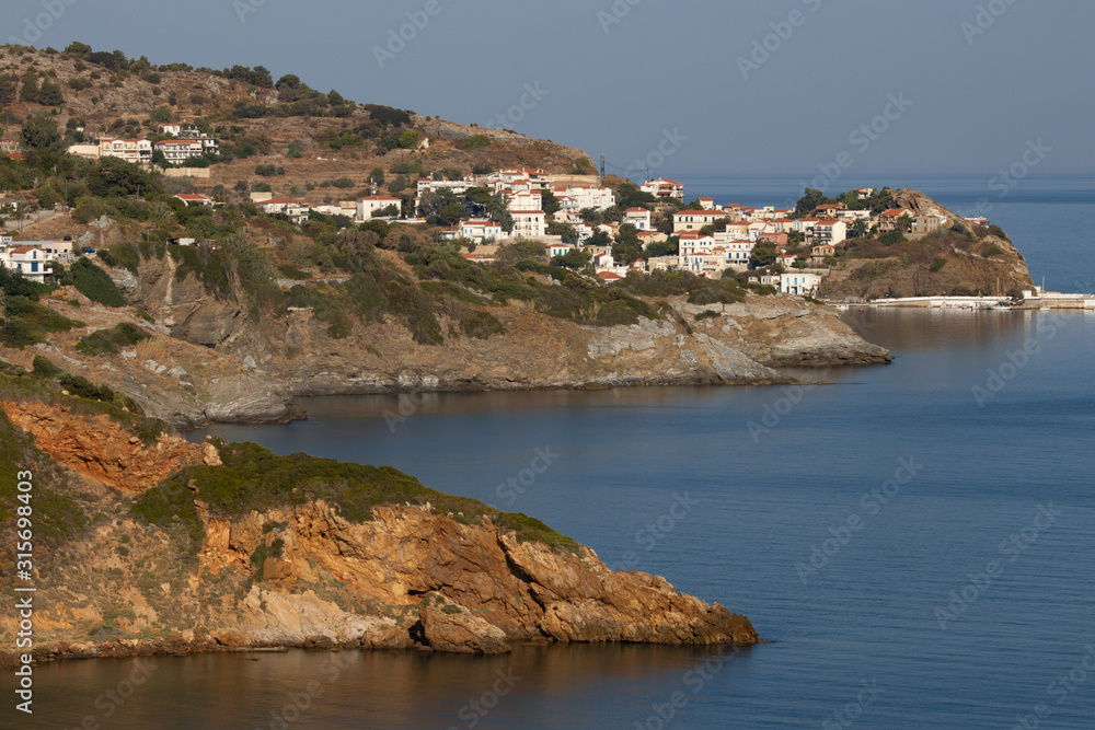 enchanting rocky coastal town Evdilos, Ikaria, Greek Islands 