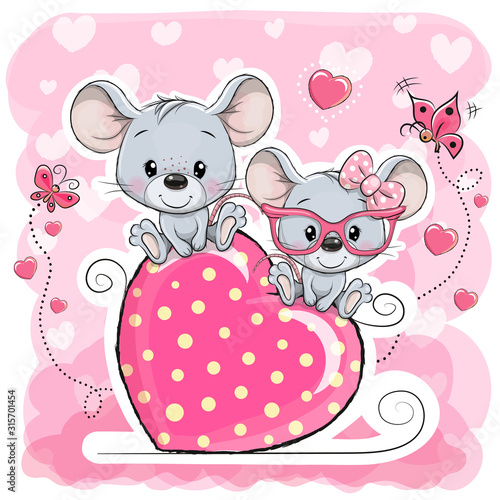 Two cats is sitting on a heart on a pink background