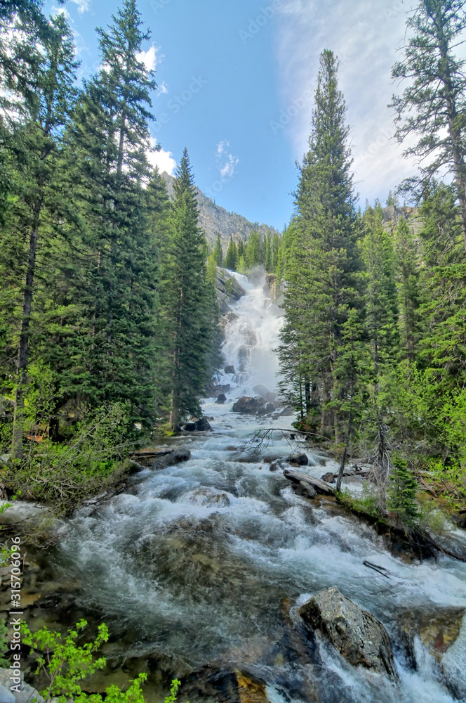Hidden Falls - waterfall in Grand Teton National Park Hidden Falls - waterfall in Grand Teton National Park