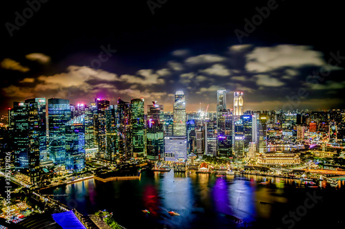 Aerial View of the Singapore Skyline at night © Torval Mork