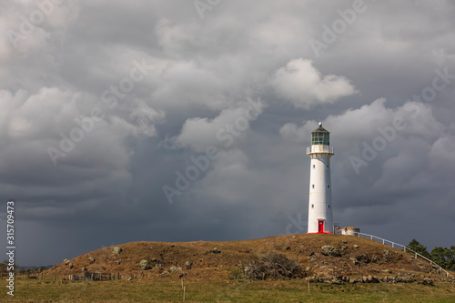 New Zealand, South Taranaki District, Pungarehu, Cloudy sky over Cape Egmont Lighthouse