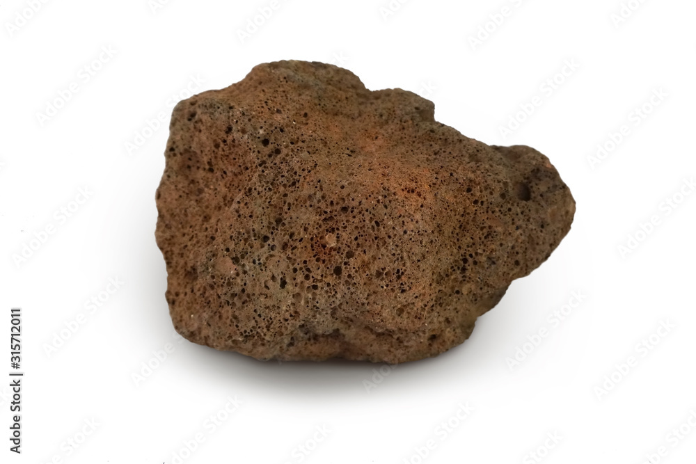 Basalt stone isolated on white background. Basalt is Extrusive igneous rock or Volcanic Rock. Basalt has a fine texture. Dark or gray to black, brown to heavy and mostly porous. Basalt stone isolated on white background. Basalt is Extrusive igneous rock or Volcanic Rock. Basalt has a fine texture. Dark or gray to black, brown to heavy and mostly porous.