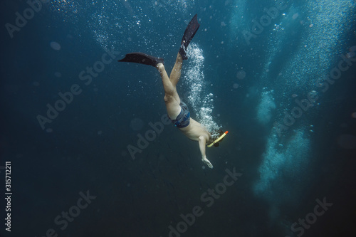 Wallpaper Mural Man snorkeling underwater, Gili Meno, Gili islands, Bali, Indonesia Torontodigital.ca