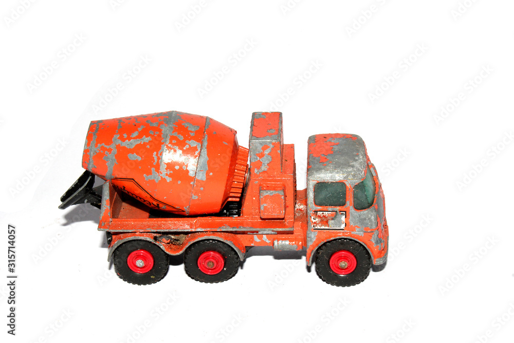 Fototapeta premium Vintage Tin Toy Vehicle Industrial Truck on White Background 