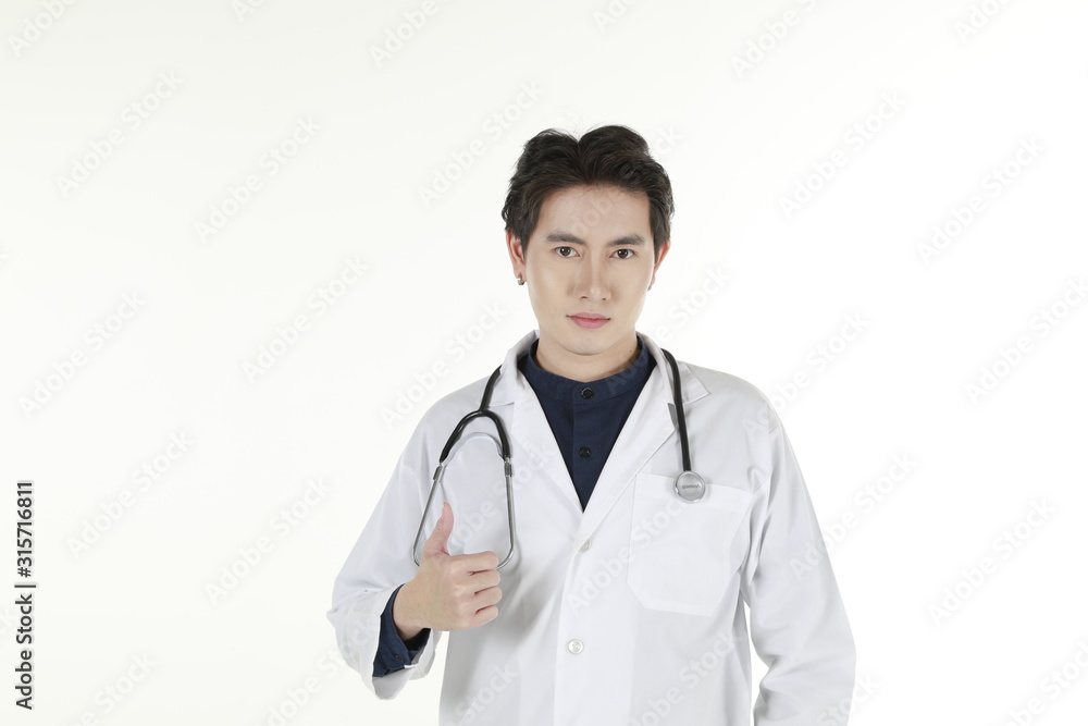 the young asian medical doctor and his stethoscope at isolated white background copy space the young asian medical doctor and his stethoscope at isolated white background copy space