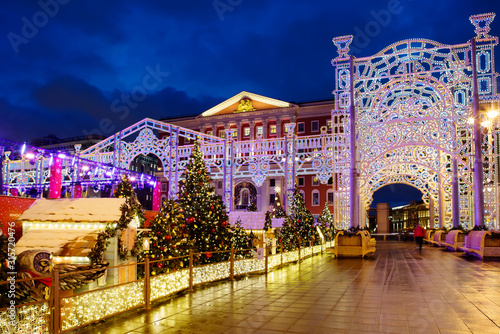 Moscow, Russia, New Year and Christmas. Installations in front of Town Hall. 2020.  Moscow city hall building on the side of Tverskaya square. The streets of Moscow were decorated with Christmas trees photo