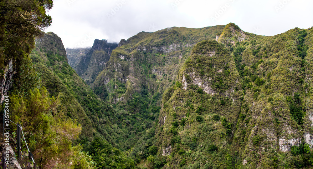 Mountain landscape, view from the hiking path of the Lavado do Caldeirao Verde on the island of Madeira, Portugal.