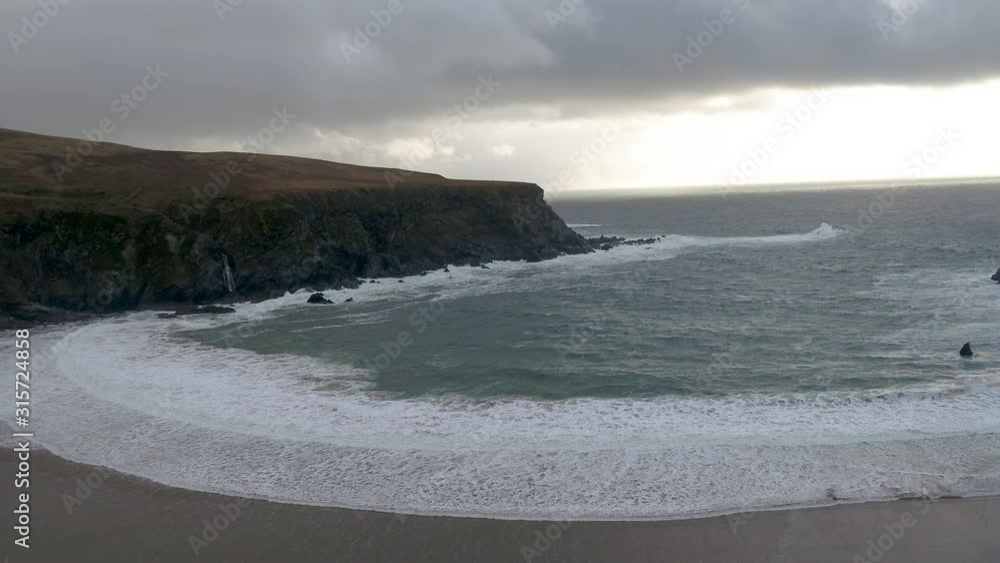 Aerial view of the beautiful coast at Malin Beg looking in County Donegal, Ireland. Aerial view of the beautiful coast at Malin Beg looking in County Donegal, Ireland.