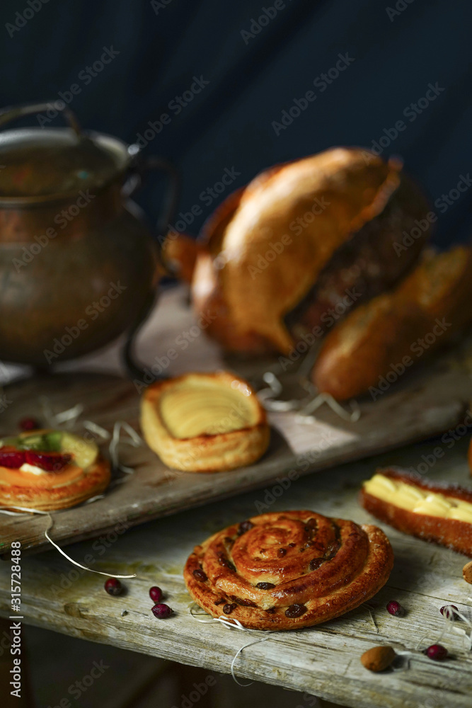 Bread on a wooden background in the rustic style Bread on a wooden background in the rustic style