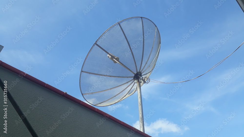 satelite dish on top building