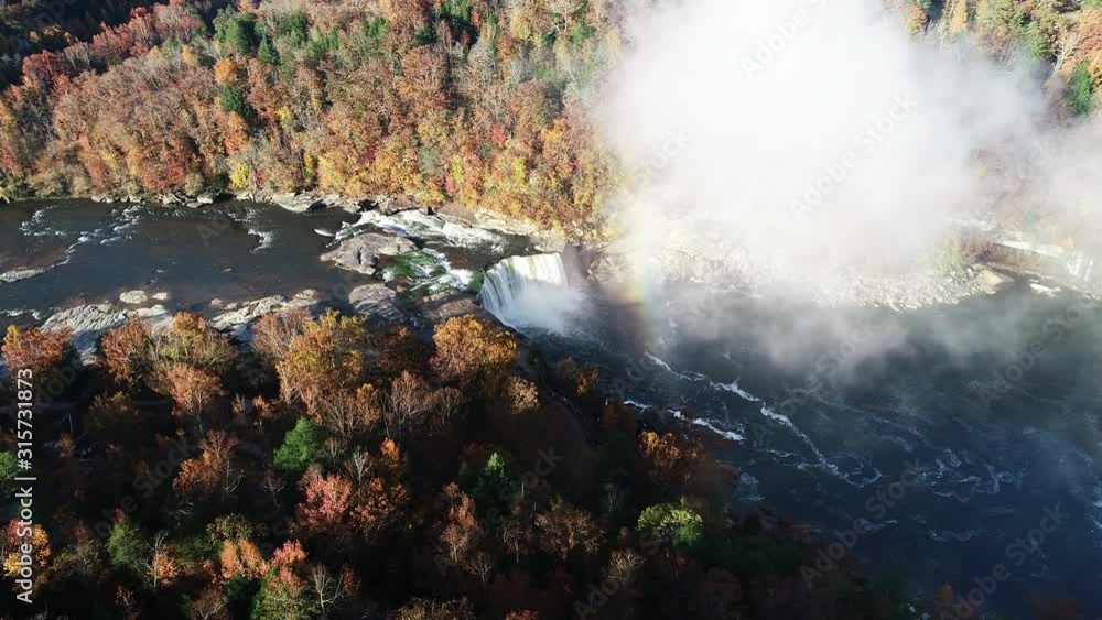 Panning aerial, rainbow over Cumberland Falls in autumn Panning aerial, rainbow over Cumberland Falls in autumn